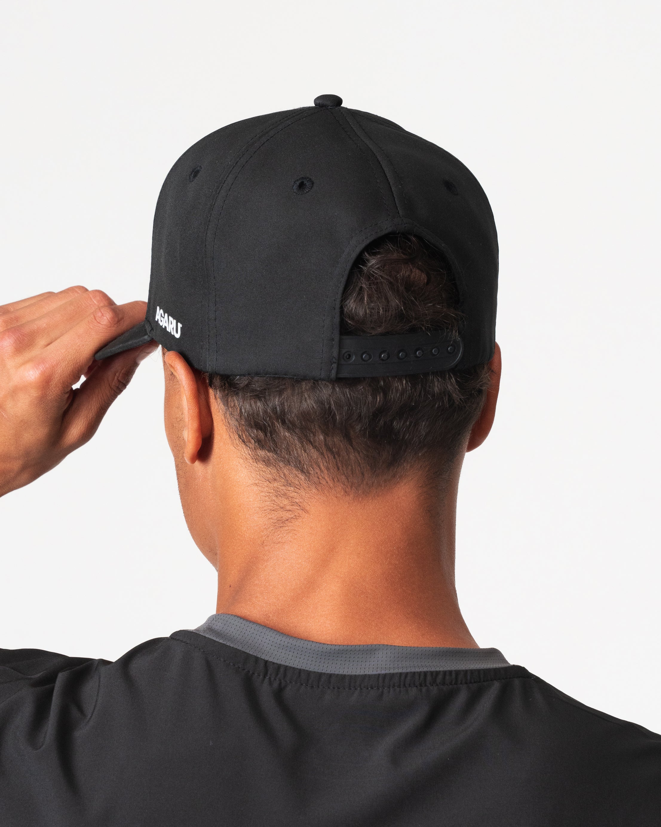 SRG Cap in Black, back view showing snapback closure