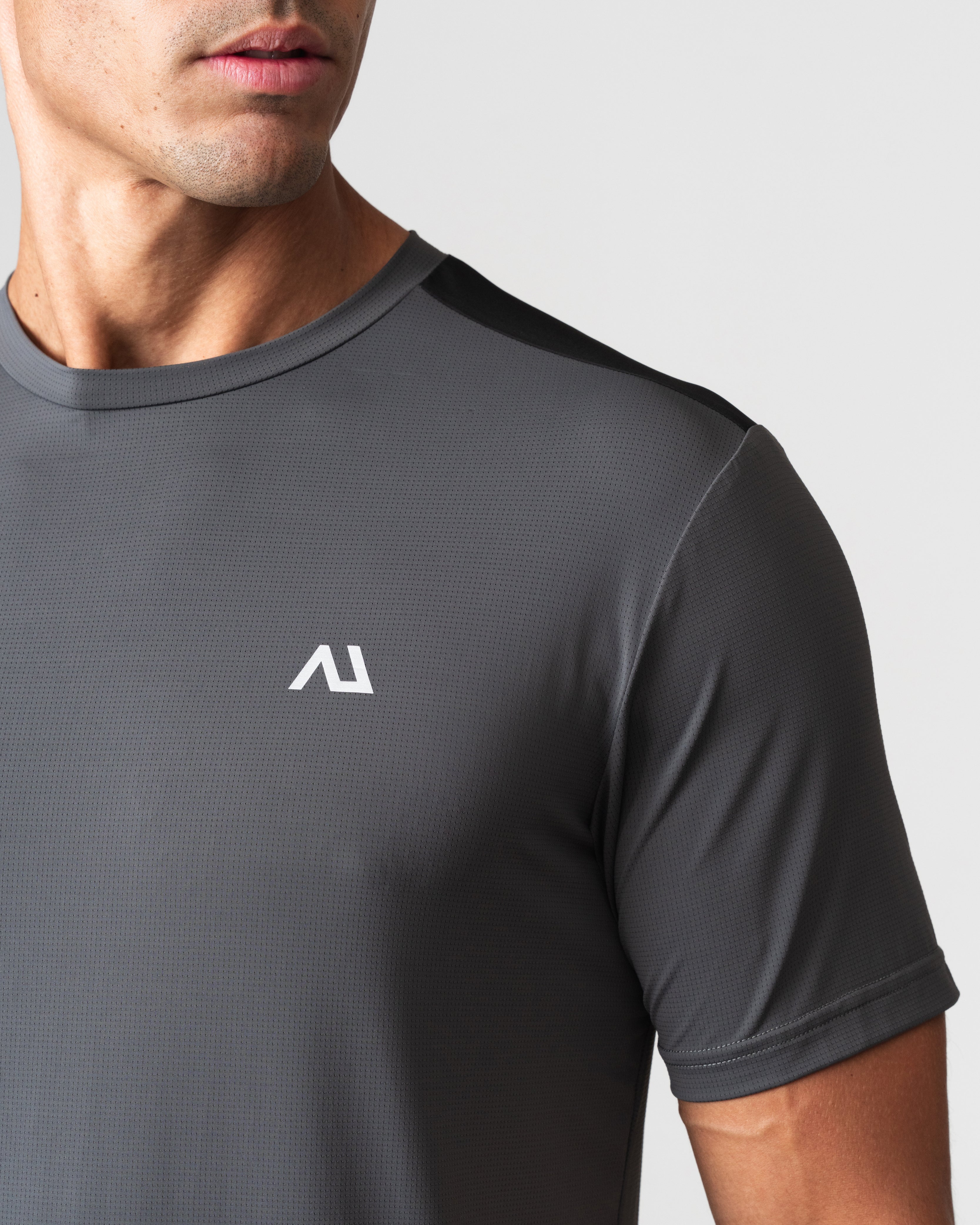 SRG T-Shirt in black, close-up of chest logo