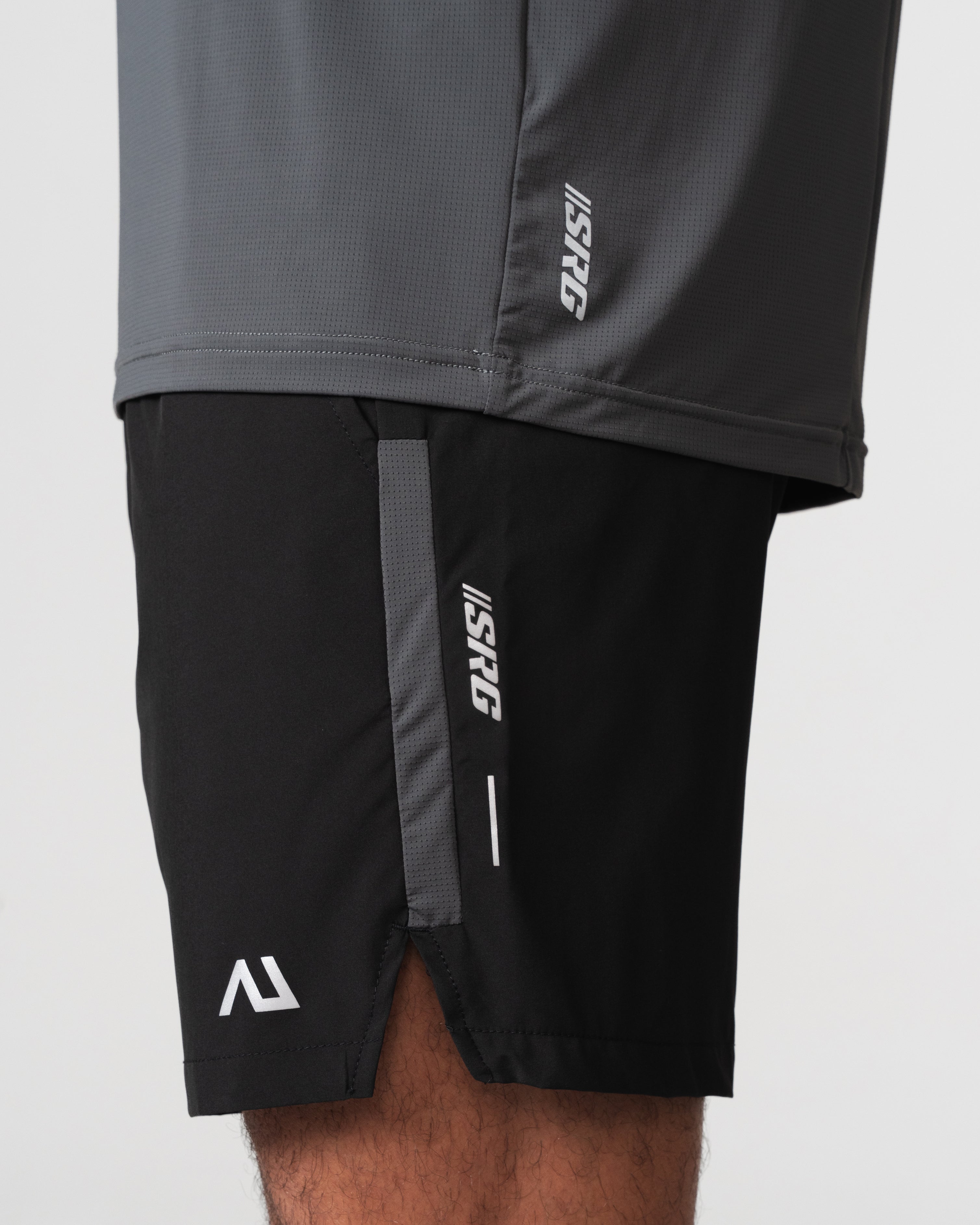 SRG T-Shirt in black, close-up of hem and SRG taping