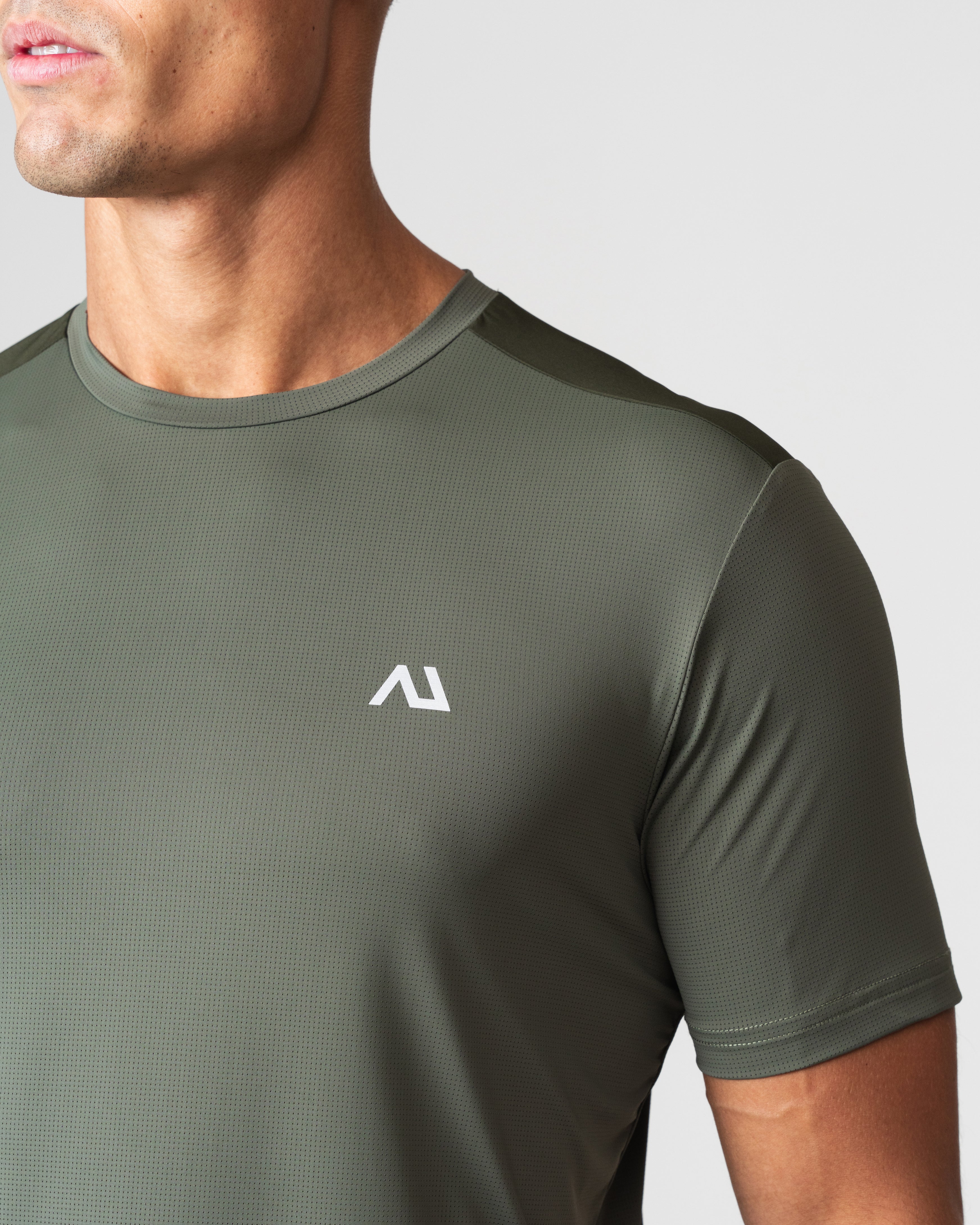 SRG T-Shirt in green, close-up of chest logo