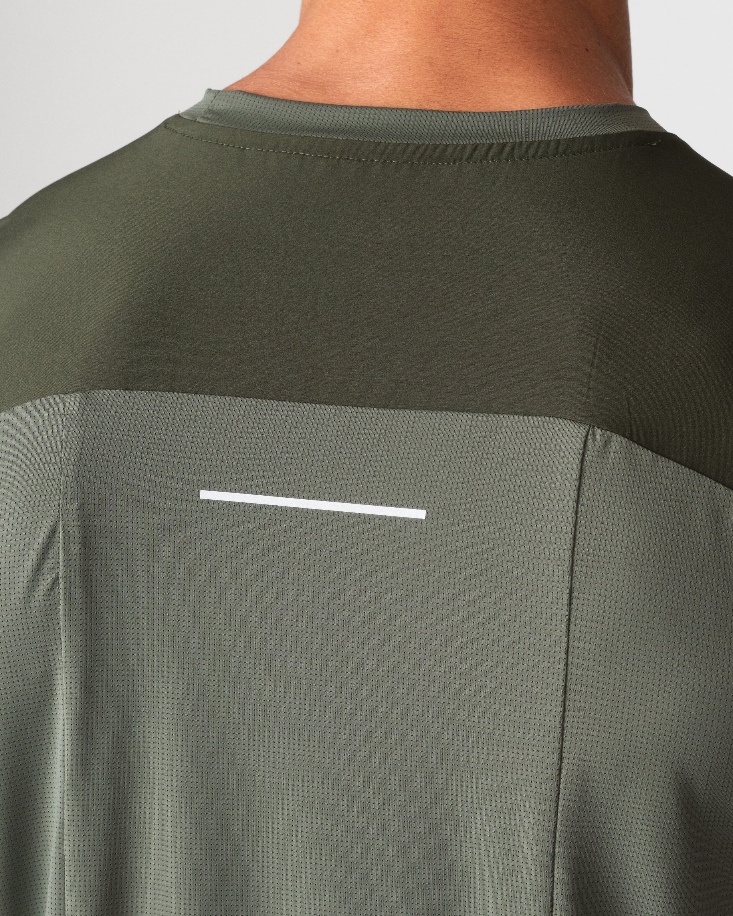 SRG T-Shirt in green, close-up of back yoke and reflective detail