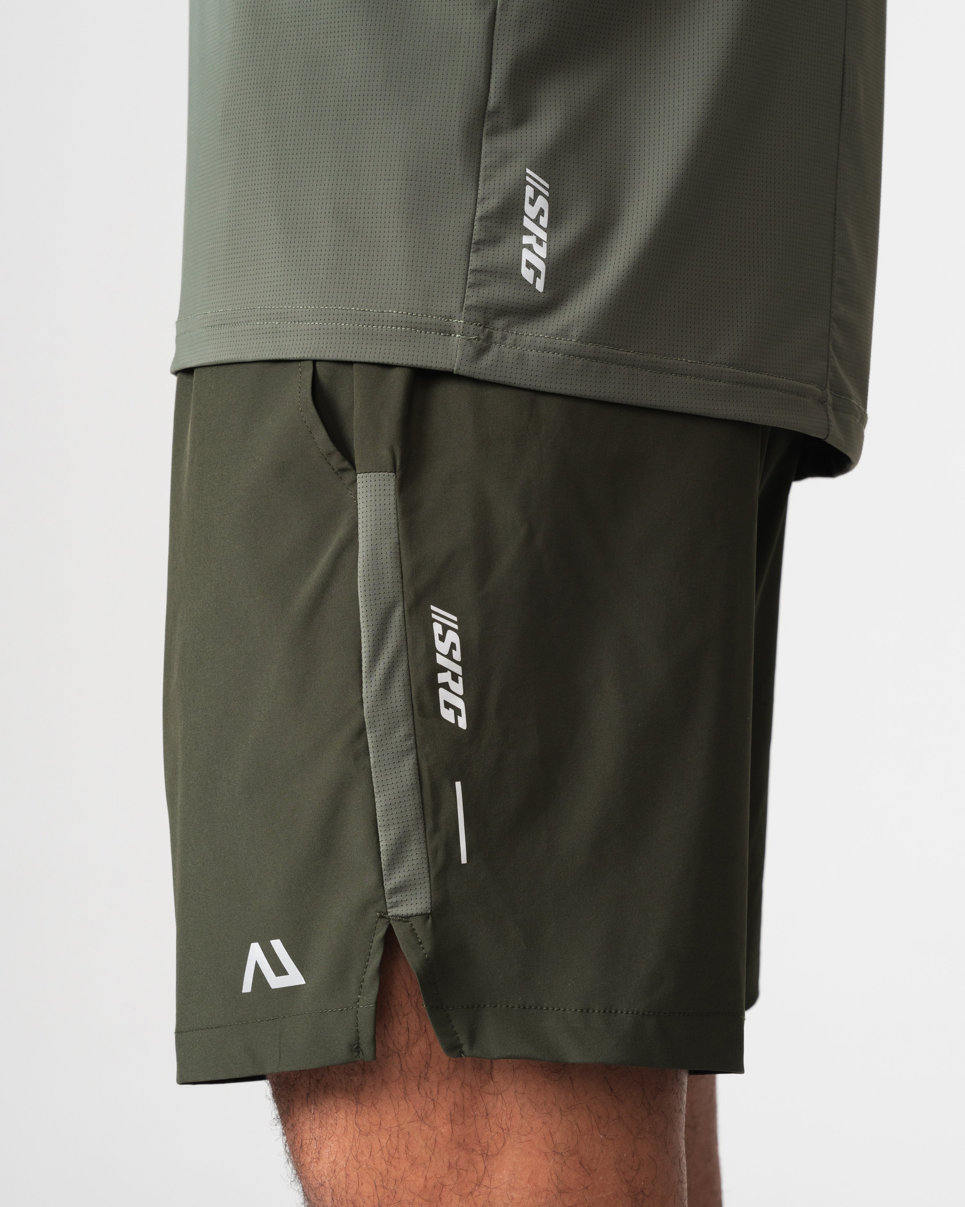 SRG T-Shirt in green, close-up of hem and SRG taping